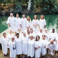 Christian Group baptizm River Jordan