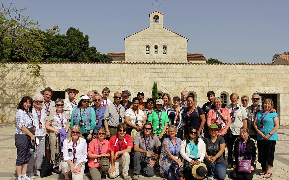 A church group visiting an ancient site In Israel