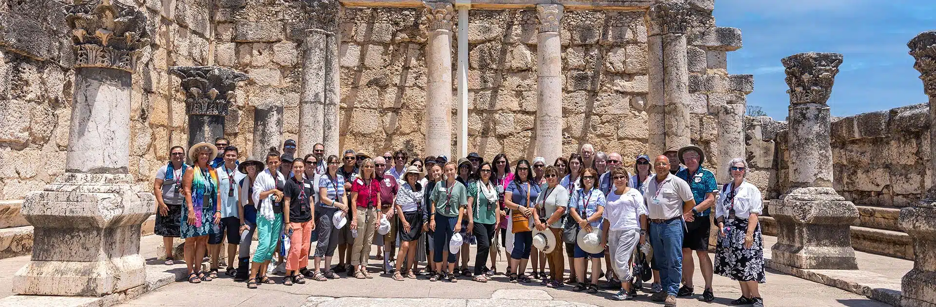 America Israel Tours (AIT) group photo at the ancient synagogue in Capernaum, Sea of Galilee