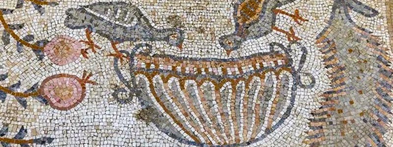 The mosaic’s images—cypress trees, fruit, and Egyptian geese