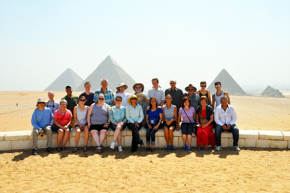 An Into the Promised Land tour in front of the pyramids